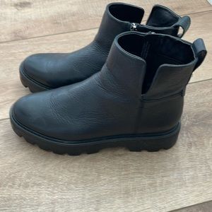 Black Chelsea boots by Franco Sarto
